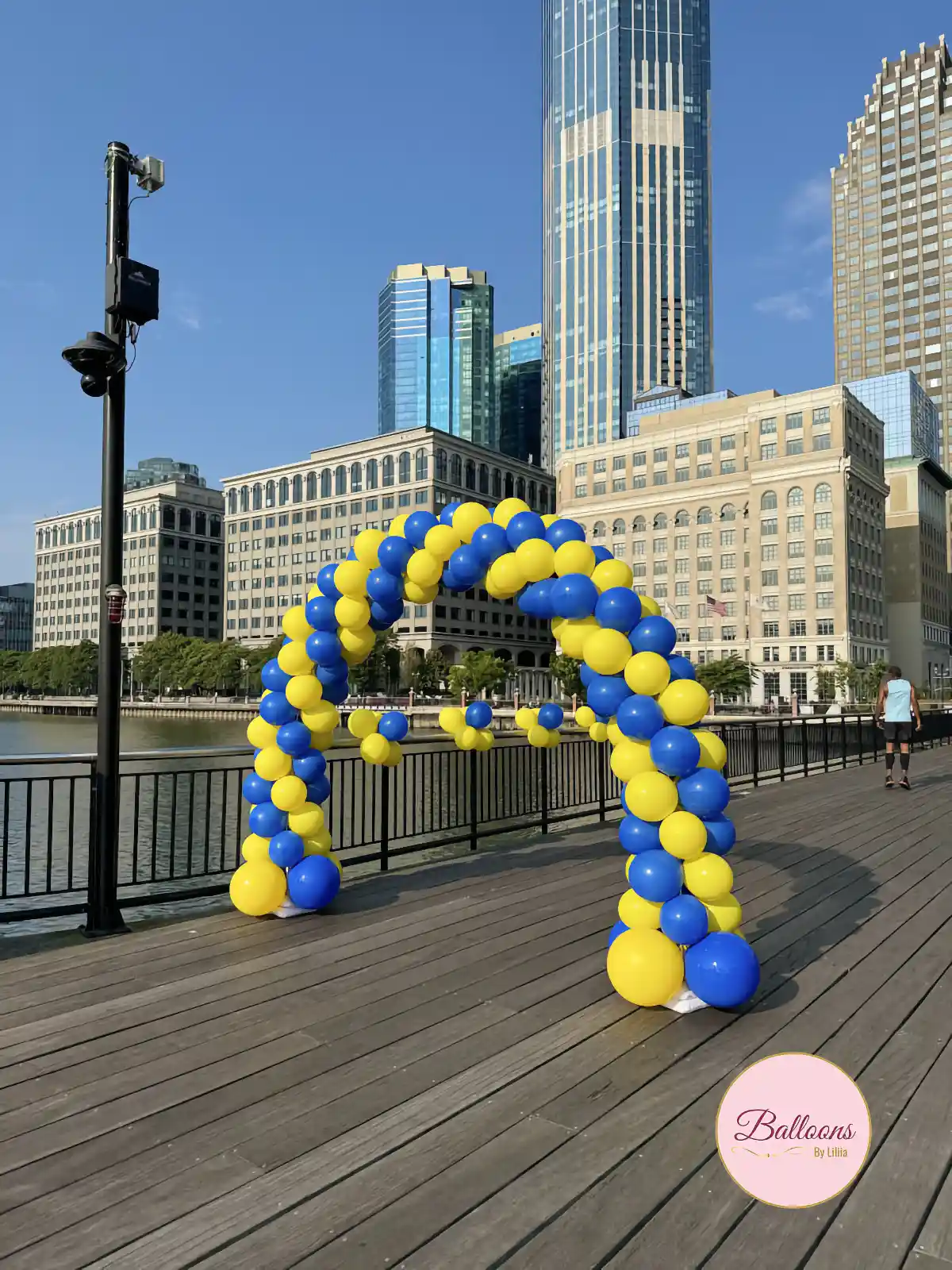 business grand opening balloon setup with branding