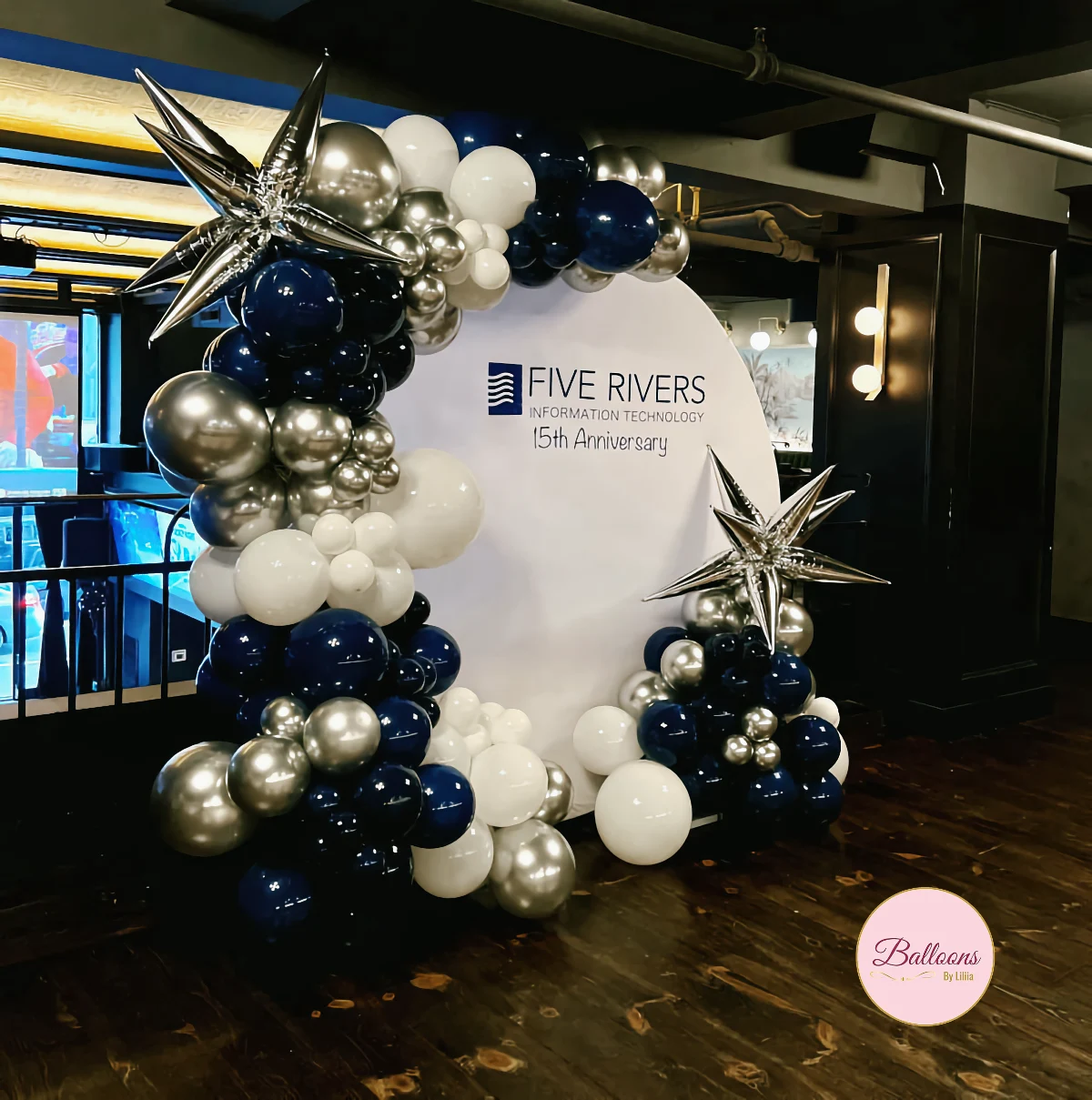 company holiday party balloon backdrop