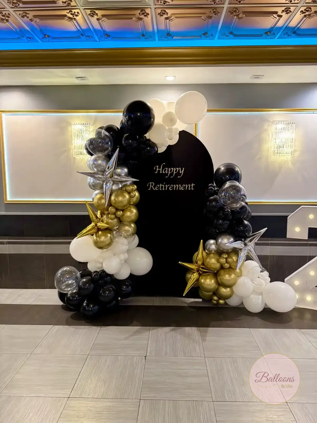 retirement balloon decorations setup in New Jersey backyard party