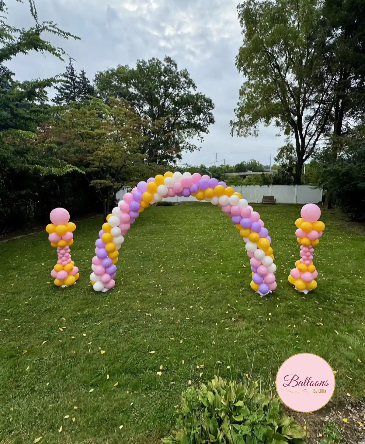 * elegant bridal shower balloon setup with neutral colors